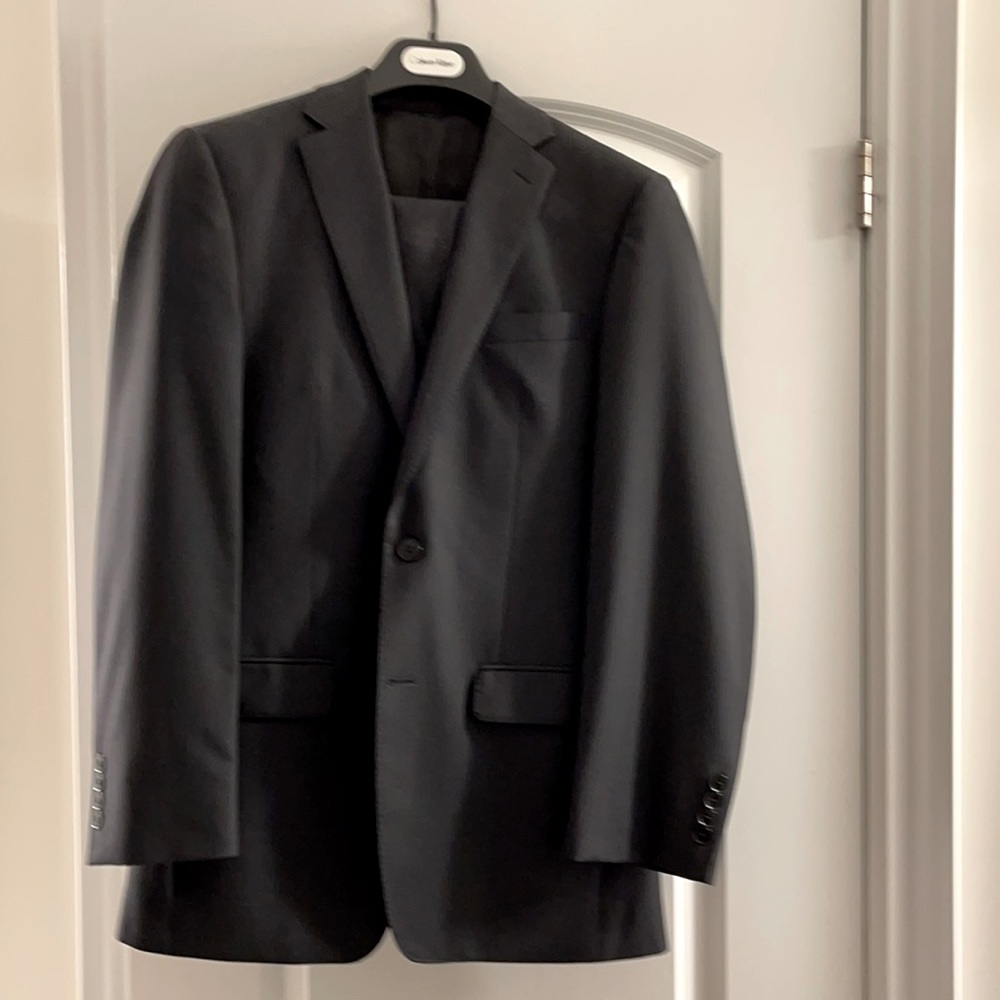 Calvin Klein suite.  Black pin stripes, 38R